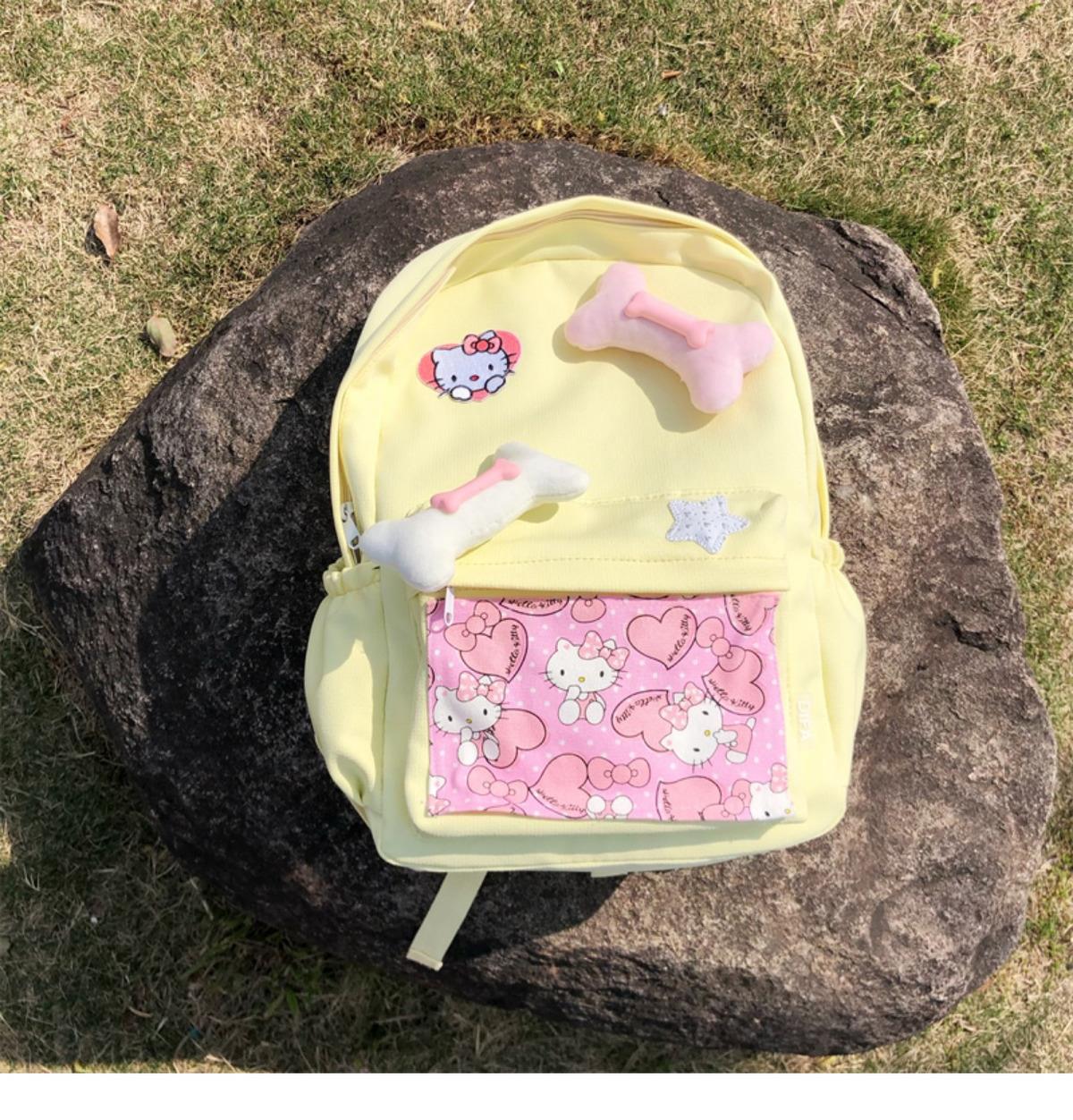 辣妹设计感背包可爱卡通猫猫骨头大容量清新黄色书包大学生双肩包详情9