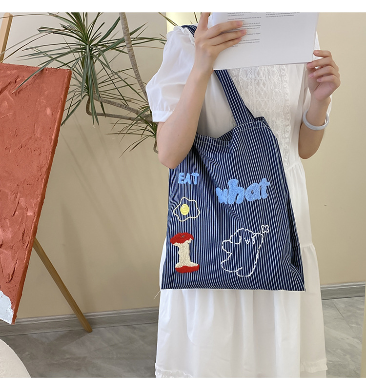 韩版时尚条纹帆布包包女2024新款大容量通勤托特包小众休闲布包详情8