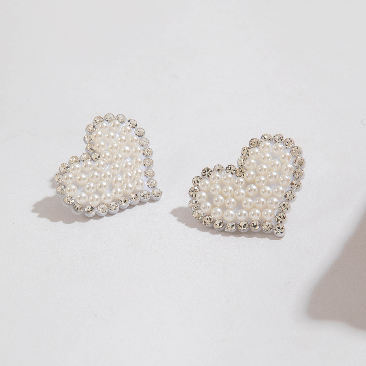 欧美跨境时尚镶钻大蝴蝶耳坠气质高级感桃心蝴蝶结仿珍珠耳饰女详情6