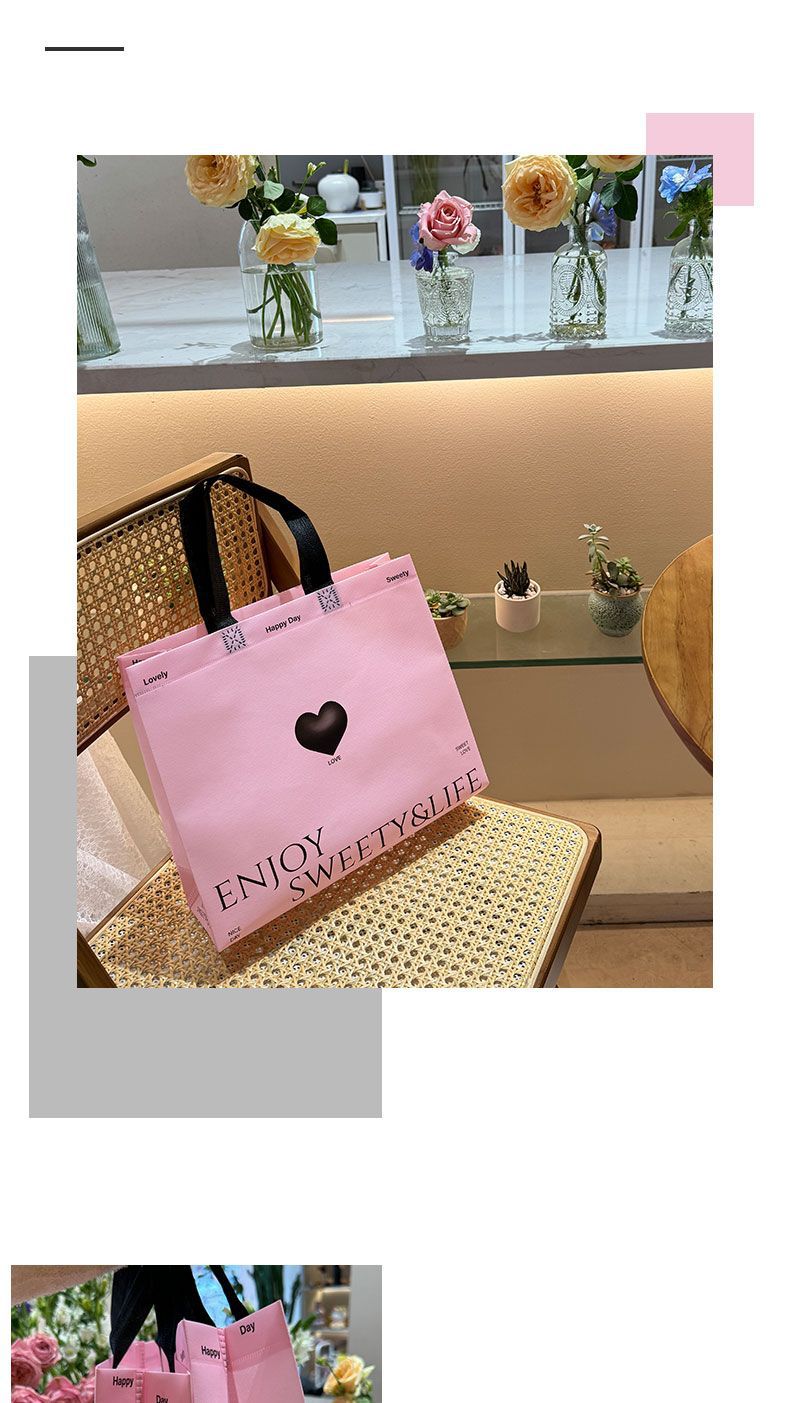 粉色爱心手提服装袋子无纺布定制购物袋服装店用包装塑料袋子详情9