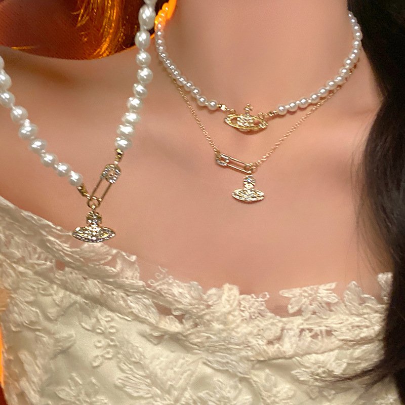 The Western Queen Saturn necklace, female star ball pearl brooch, simple and niche necklace accessory, light luxury and high-end collarbone chain pic 8