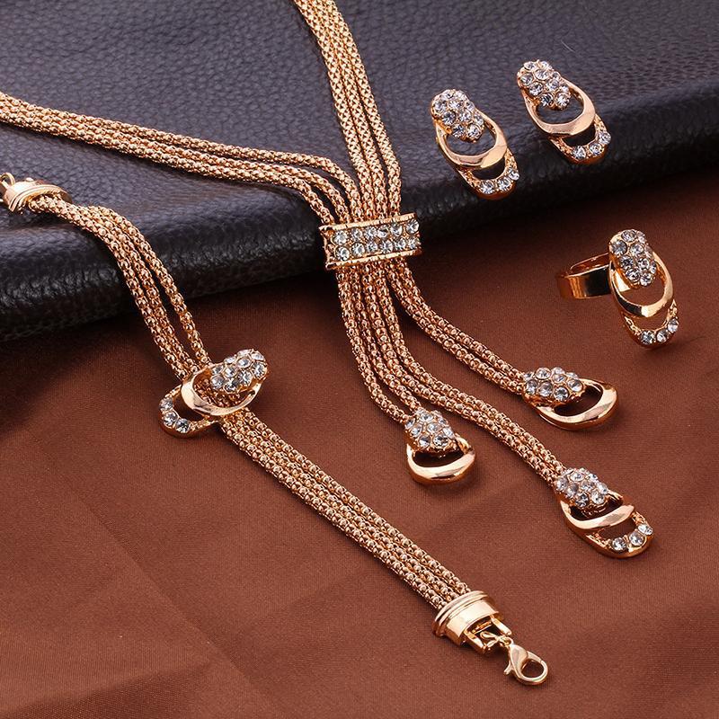 Cross-border best-selling gold-plated exaggerated crystal jewelry set, creative bride diamond-encrusted necklace, earrings and ring four-piece set pic 3