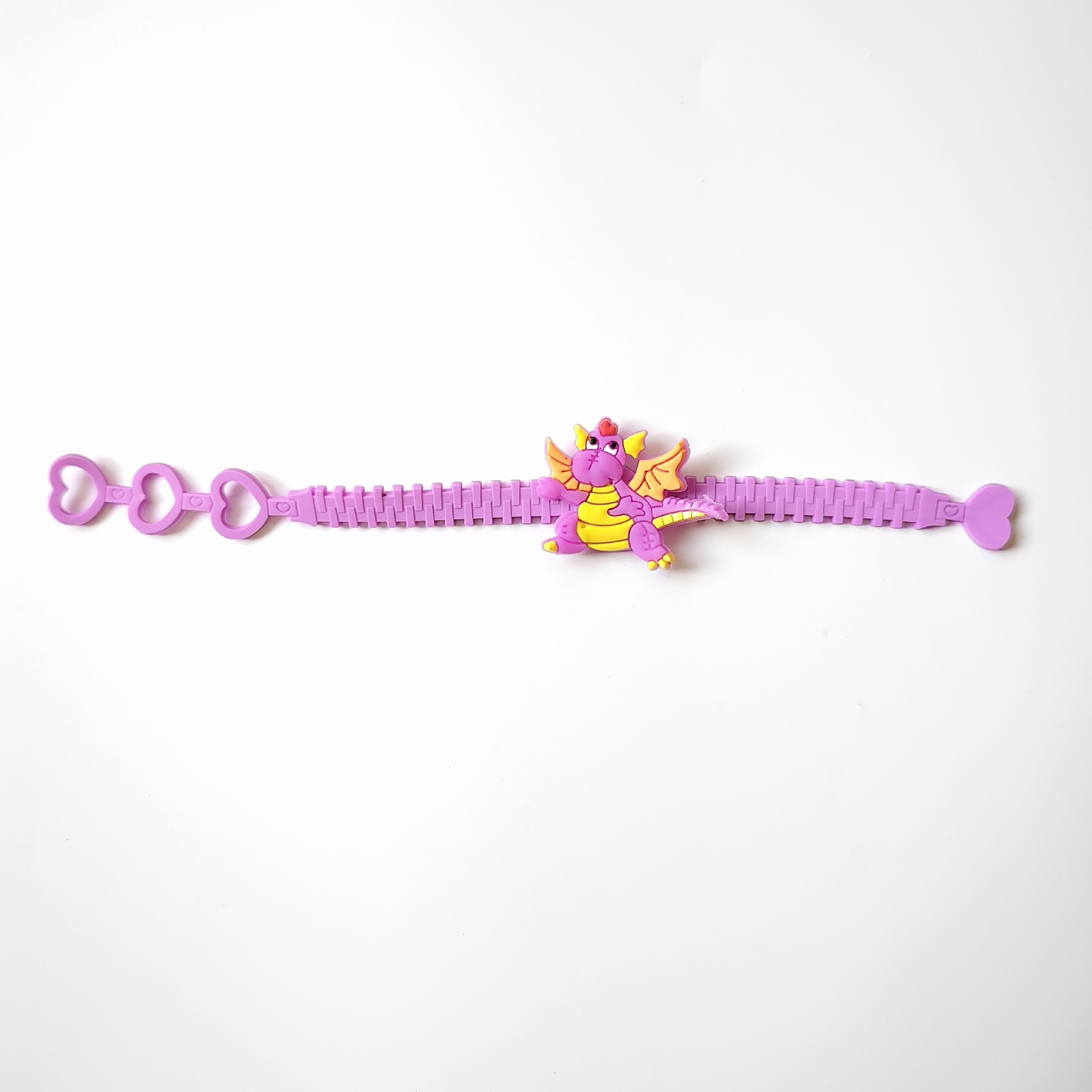 亚马逊跨境三孔桃心pvc手链创意手腕带恐龙手带儿童手环2元小礼品详情4