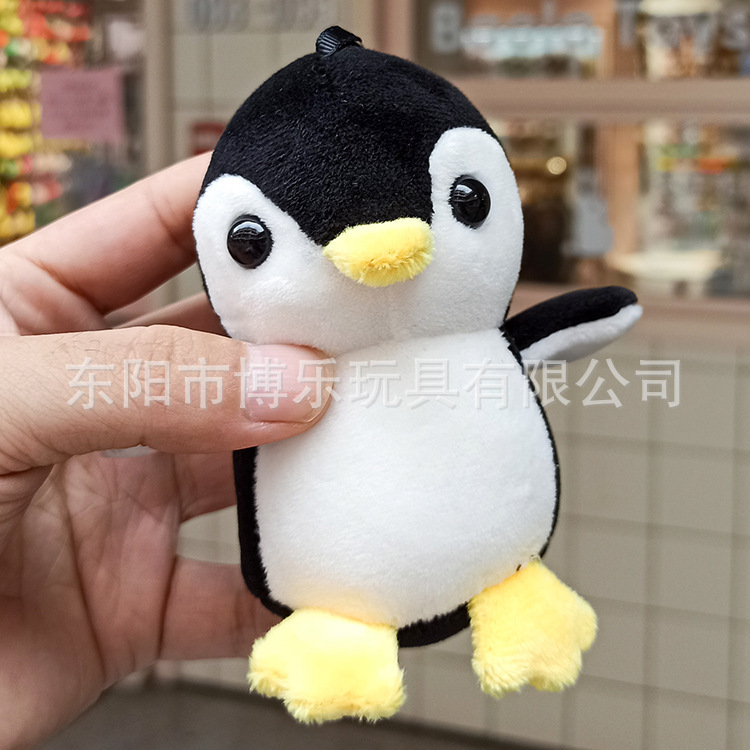 Wholesale of creative cartoon four-sided bouncing penguin plush pendants, cute animal dolls, bags, car keychains and pendants pic 2