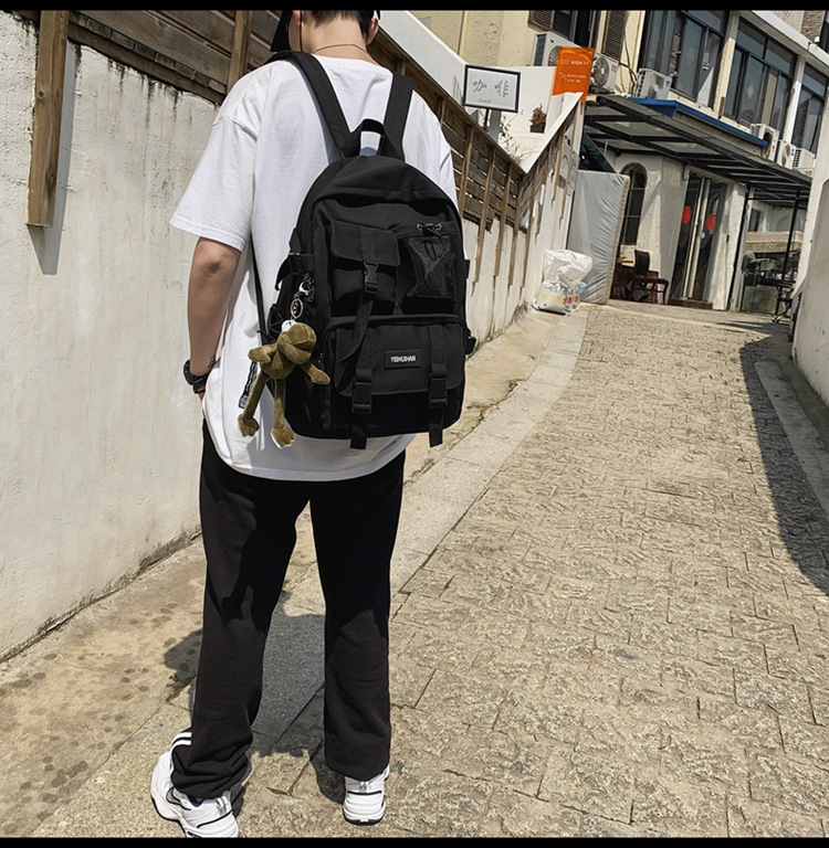 休闲百搭男女双肩包可爱挂件洋气潮流学生书包大容量工装风背包详情32
