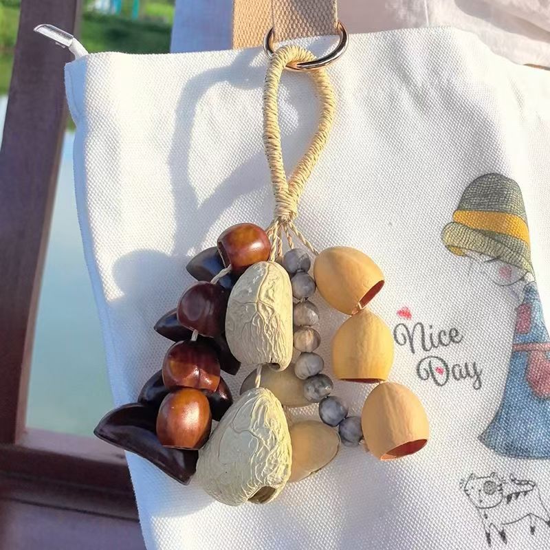 Fruit shell bell, hand-cranked bell, wind chime bag, handcrafted sound beam, bell pendant, wholesale from Indonesian black fruit shell factory pic 12