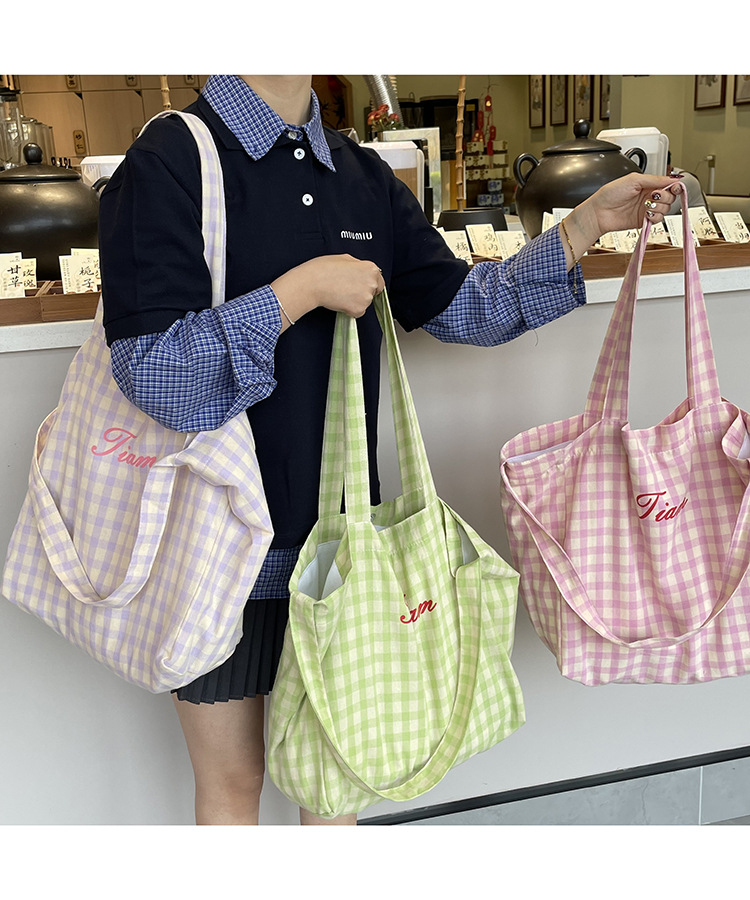 ins风字母格纹大容量托特包女2025新款度假风单肩斜挎包购物包详情2