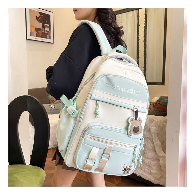 批发新款初高中学生大容量书包轻便减负背包小学生简约结实双肩包详情21