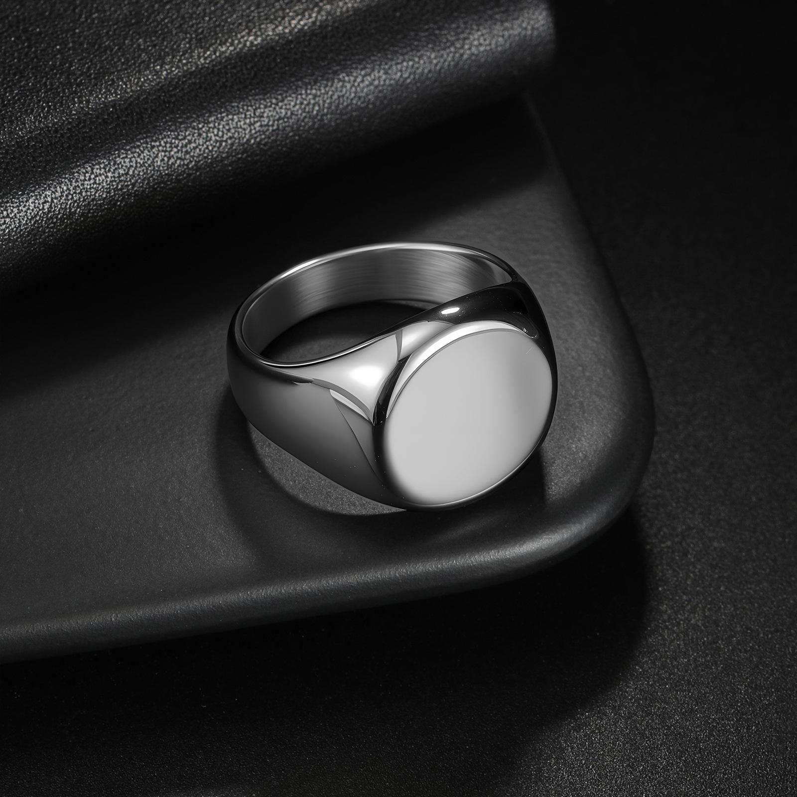 In 2025, the popular titanium steel ring for men on Amazon in Europe and America, a large circular cast ring with a logo, temu pic 6