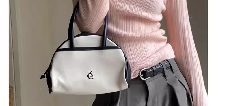 A light purple semi-high neck slim-fit innerwear with a knitted sweater for women in the spring of 2026 is a stylish and unique thin base layer pic 19