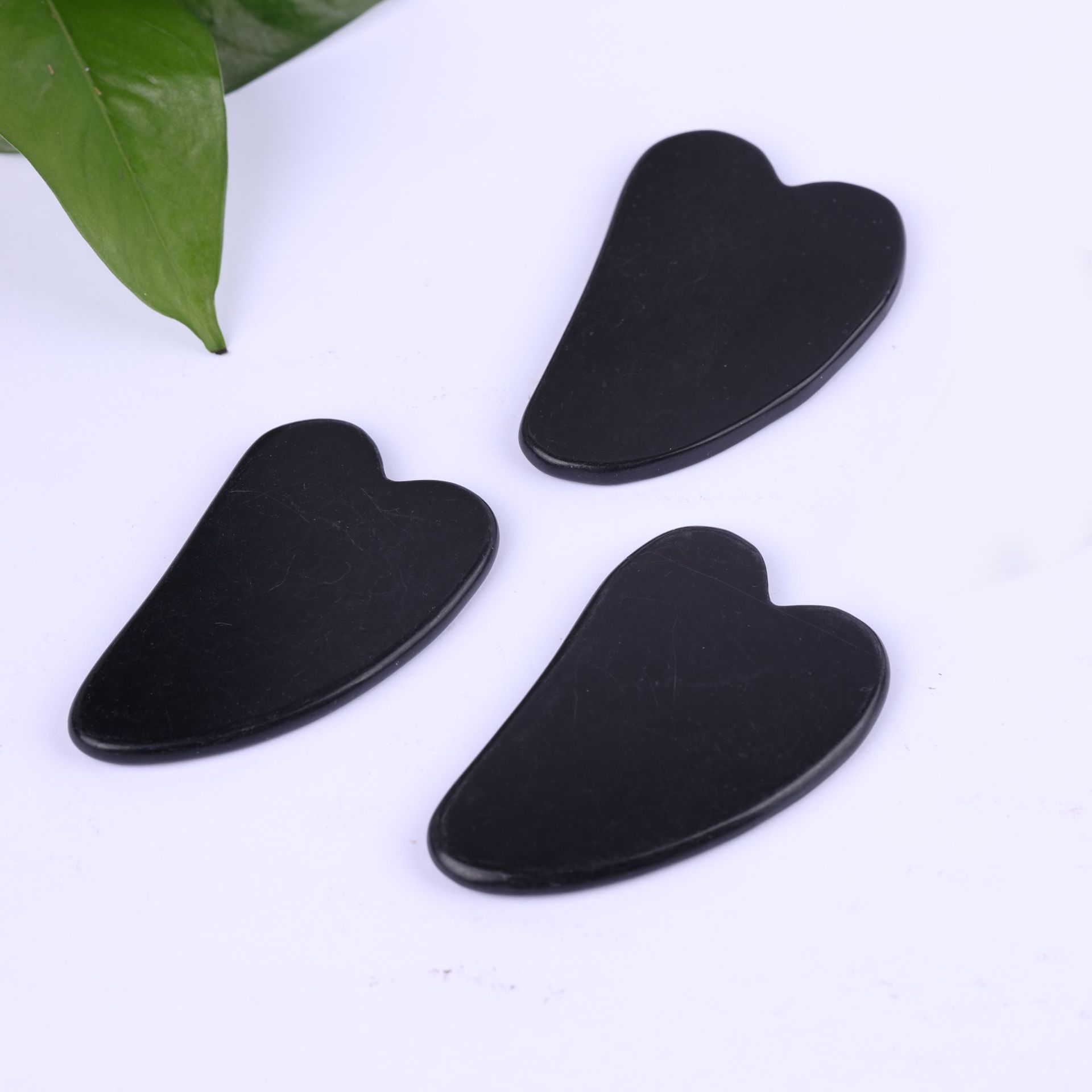 黑玉白玉玉石刮痧板按摩器美容按摩小牛角刮板玉石片砭石经络理疗护肤工具详情16