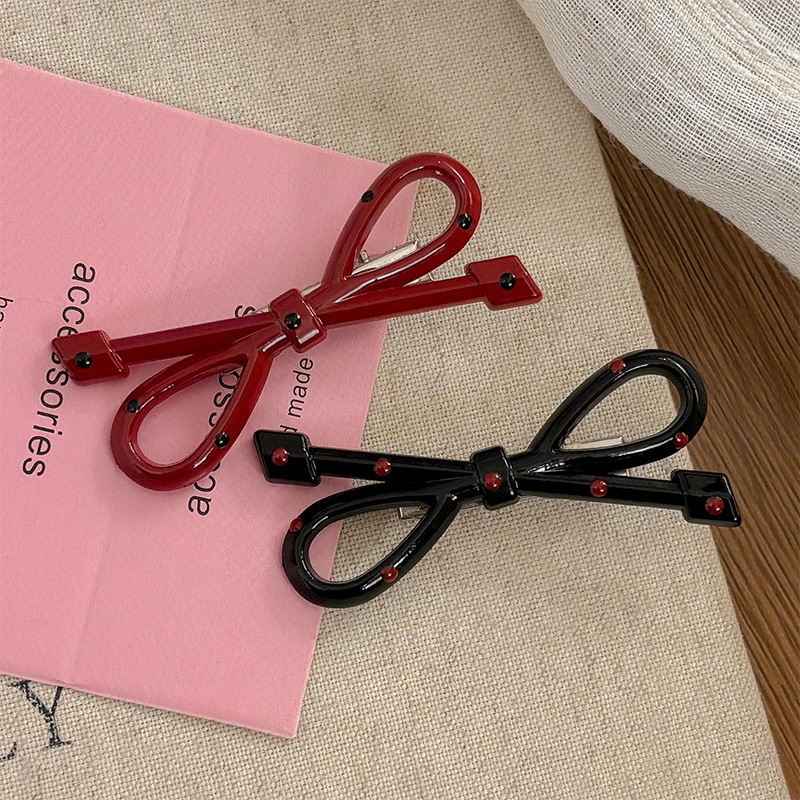 甜美波点蝴蝶结椭圆发夹女前额侧边刘海夹碎发鸭嘴夹儿童发卡头饰详情11