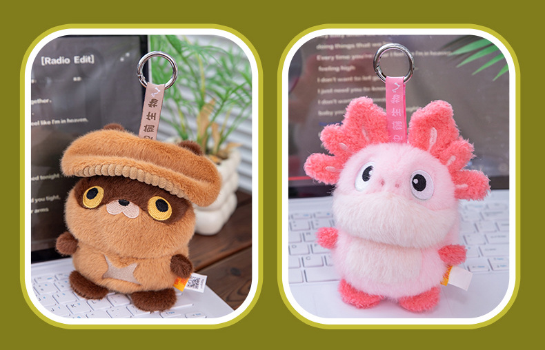 A grey totoro wearing a wizard hat and a red horned dragon plush toy AI star Man AI toy pic 16