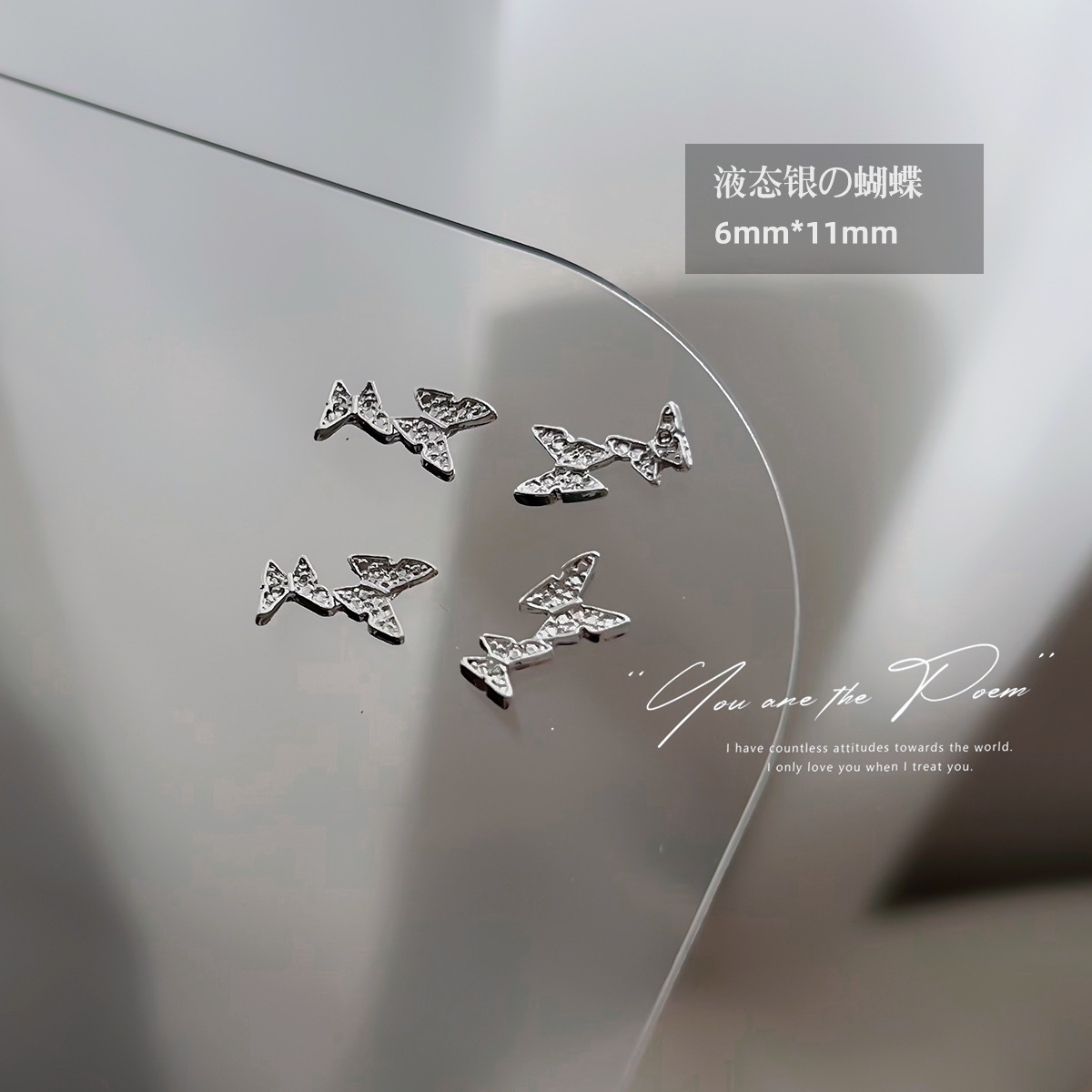Wholesale of y2k liquid silver alloy butterfly wing hollowed-out mini bow tie nail accessories pic 8