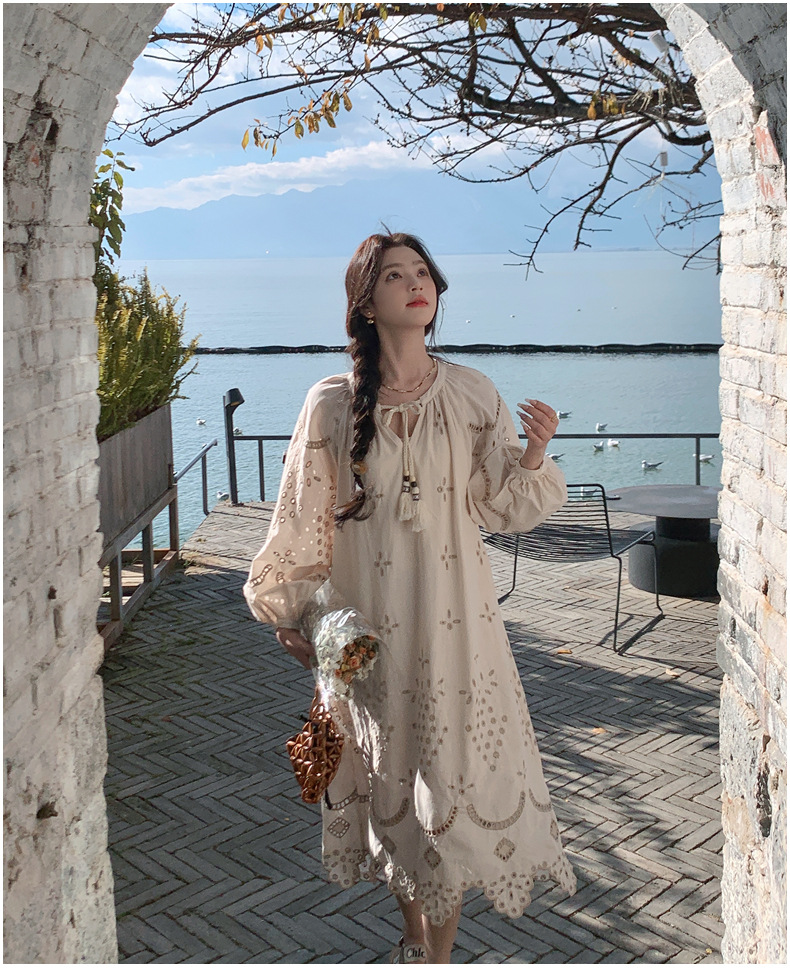 Real photo of a retro, gentle, cut-out embroidered V-neck apricot-colored dress, 2025 new seaside vacation style long-sleeved umbrella dress pic 36