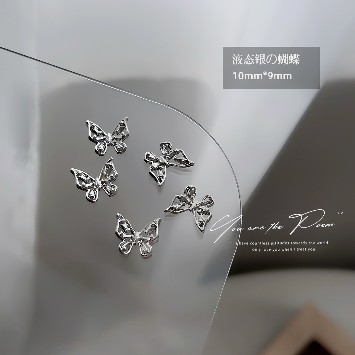 Wholesale of y2k liquid silver alloy butterfly wing hollowed-out mini bow tie nail accessories pic 7