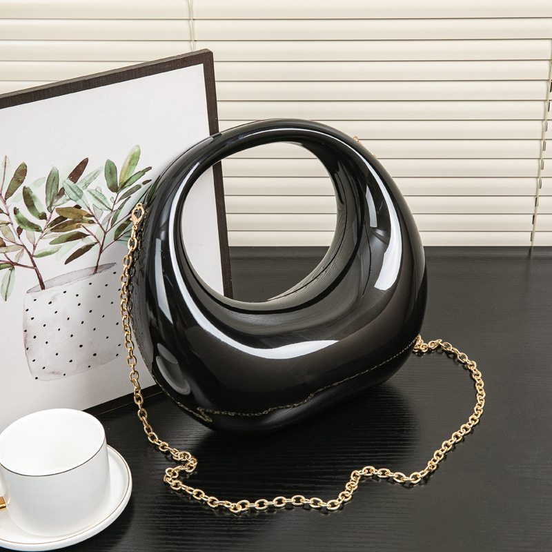 2024春夏欧美爆款跨境弯月包金银晚宴包手提包化妆亚克力包详情5