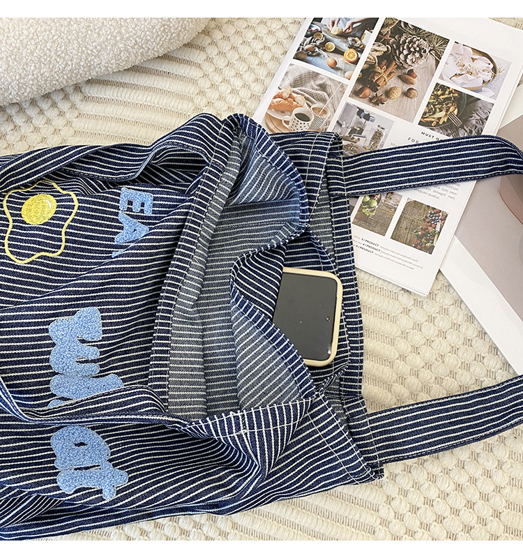 韩版时尚条纹帆布包包女2024新款大容量通勤托特包小众休闲布包详情4