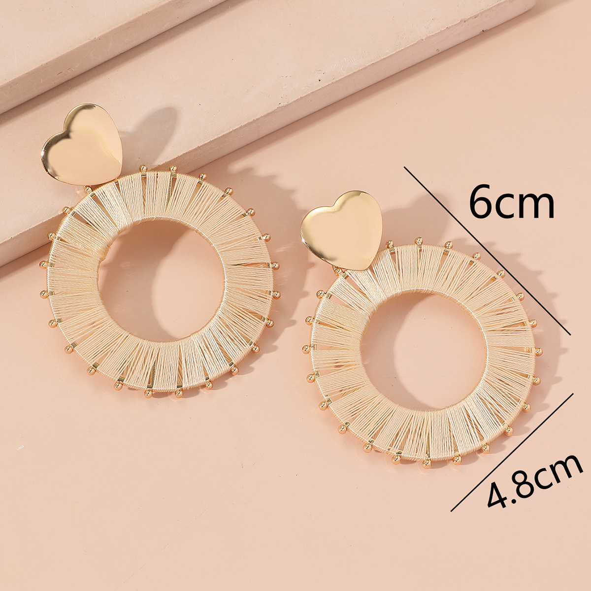 Korean exaggerated and individualistic heart-shaped sequined fresh earrings, versatile accessories, twisted twist buckle earrings 2322 pic 4