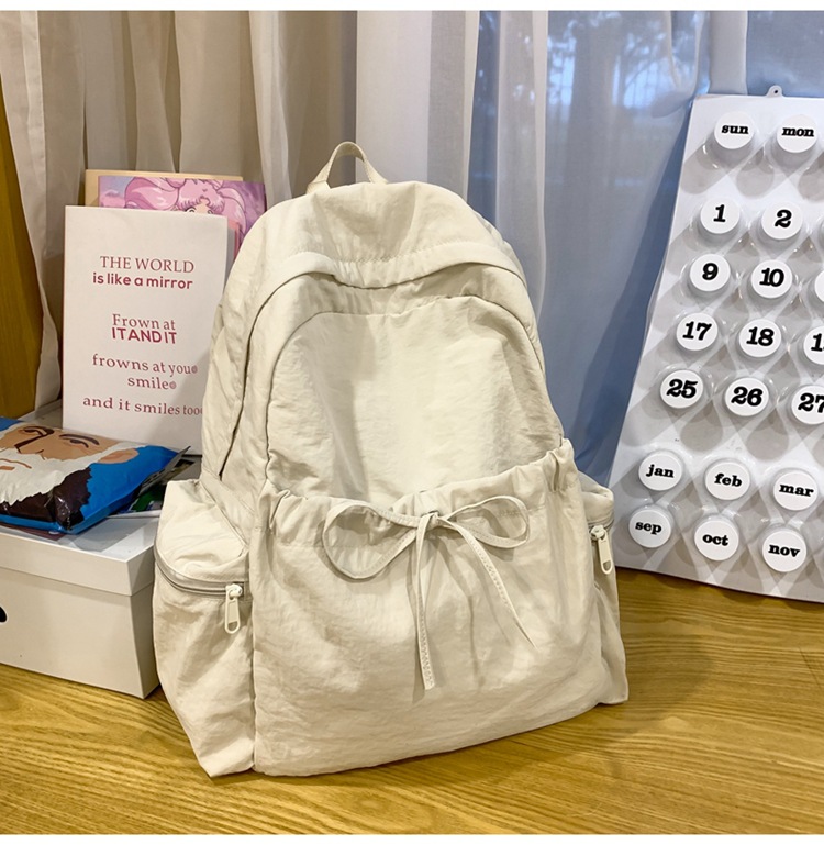 新款时尚轻便简约双肩包女日系文艺学生书包休闲运动旅行纯色背包详情39