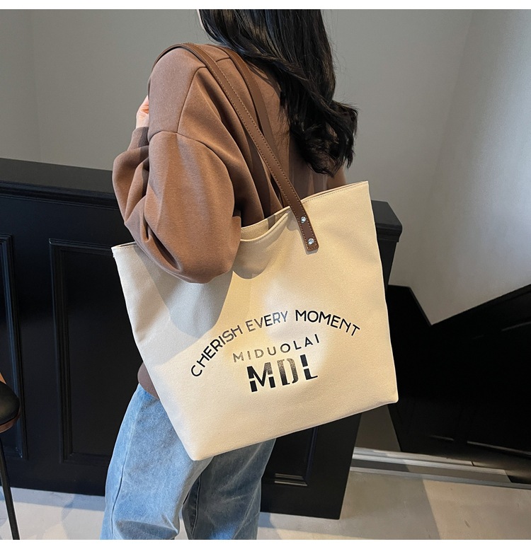Large-capacity 2025 new style simple single-shoulder hand-carry cloth bag, college student class tote bag, versatile canvas bag for women pic 15