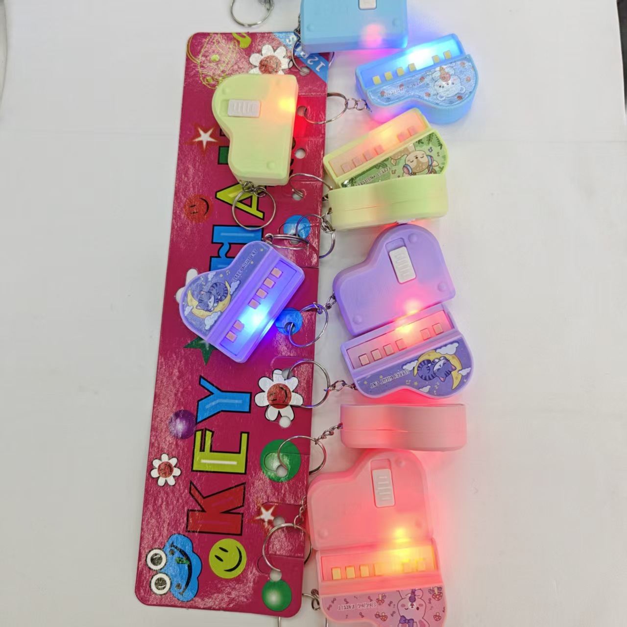 New light-emitting toy cross-border mini flashing piano keychain pendant, cute cartoon keychain gift wholesale pic 6