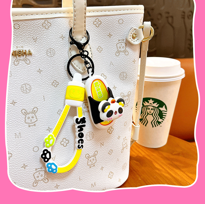 Wholesale of creative panda spinning fun slippers, keychains, cute schoolbags, pendants, car key chains, and small gifts pic 12