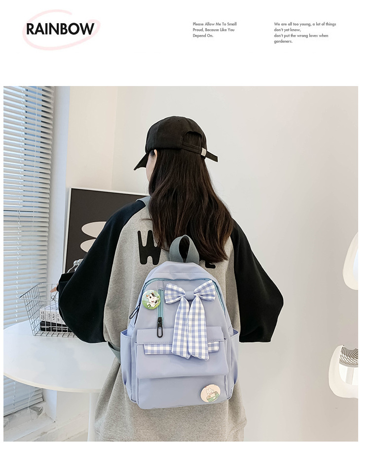 蝴蝶结书包女小学生大容量三到六年级初中轻便减负可爱简约双肩包详情6