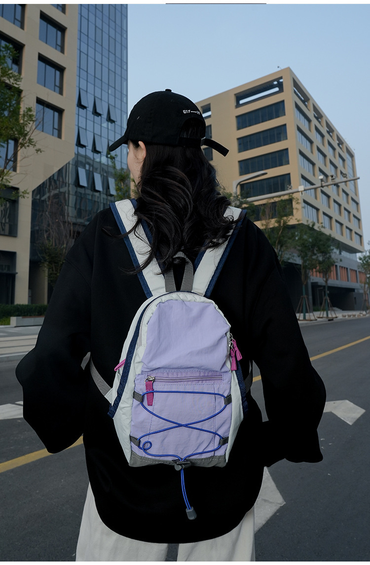 户外双肩包抽绳迷你休闲包轻便百搭旅行登山包女轻便旅游小背包详情24