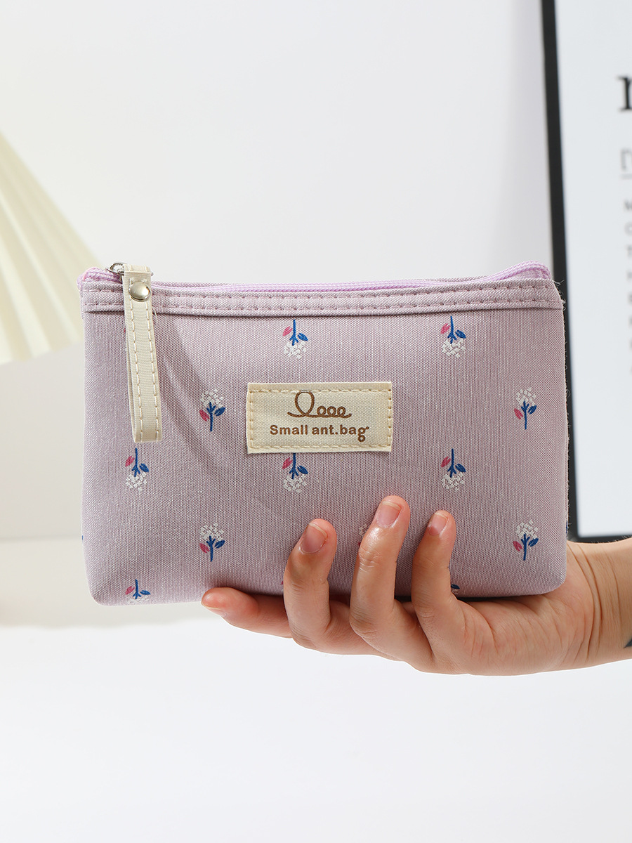 跨境印花帆布化妆包女防水便携ins风字母学生笔袋旅行收纳洗漱包详情7