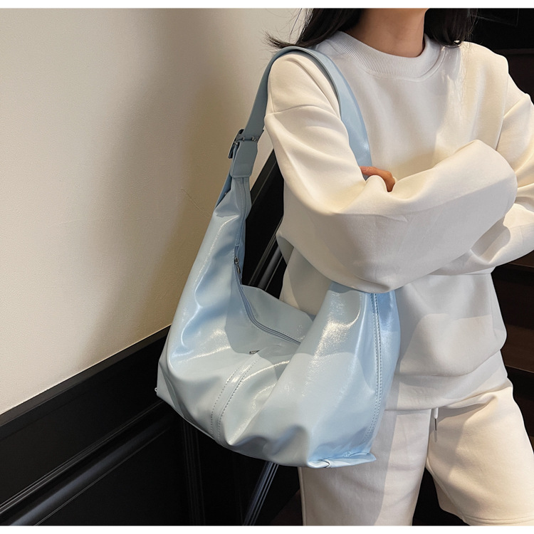 大容量腋下包女2025新款春夏季休闲百搭单肩斜挎包流行通勤饺子包详情8