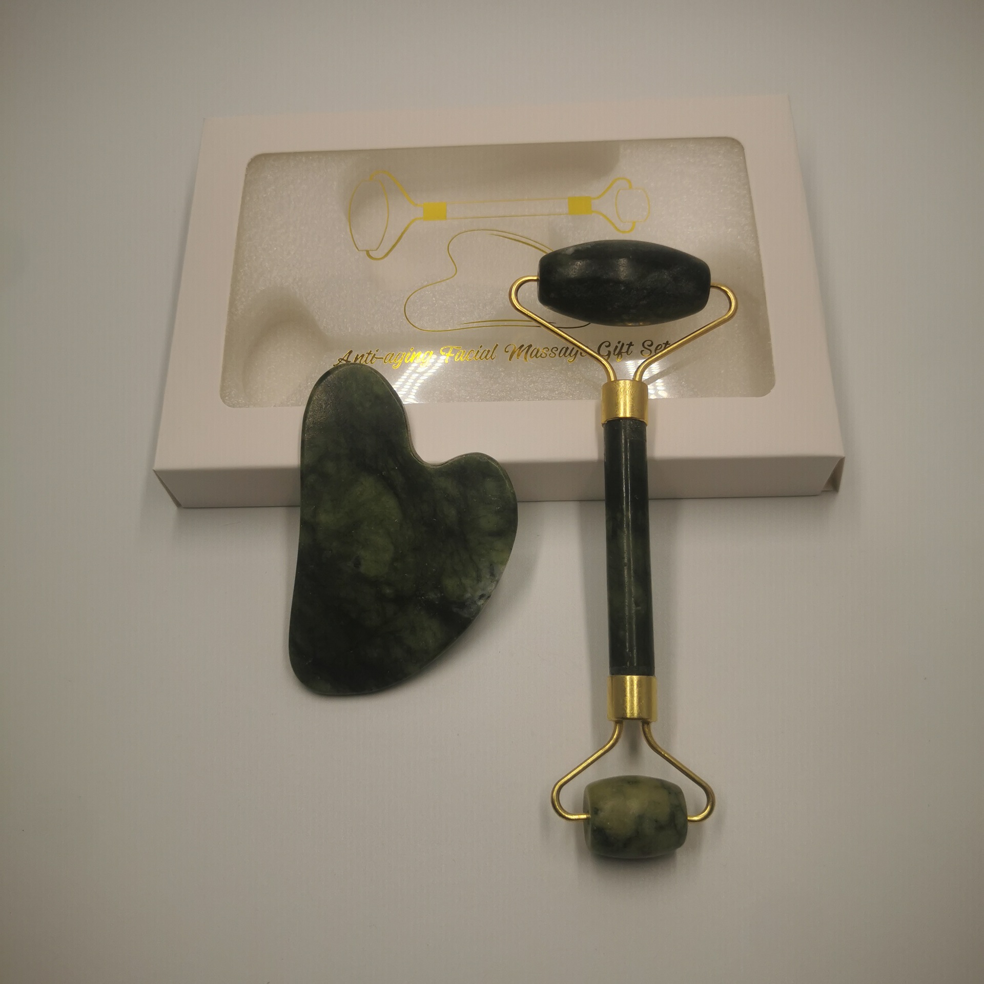 玉石刮痧板绿凤玉石脸部按摩板批发全身通用经络颈部按摩滚轮按摩器刮痧板居家详情6
