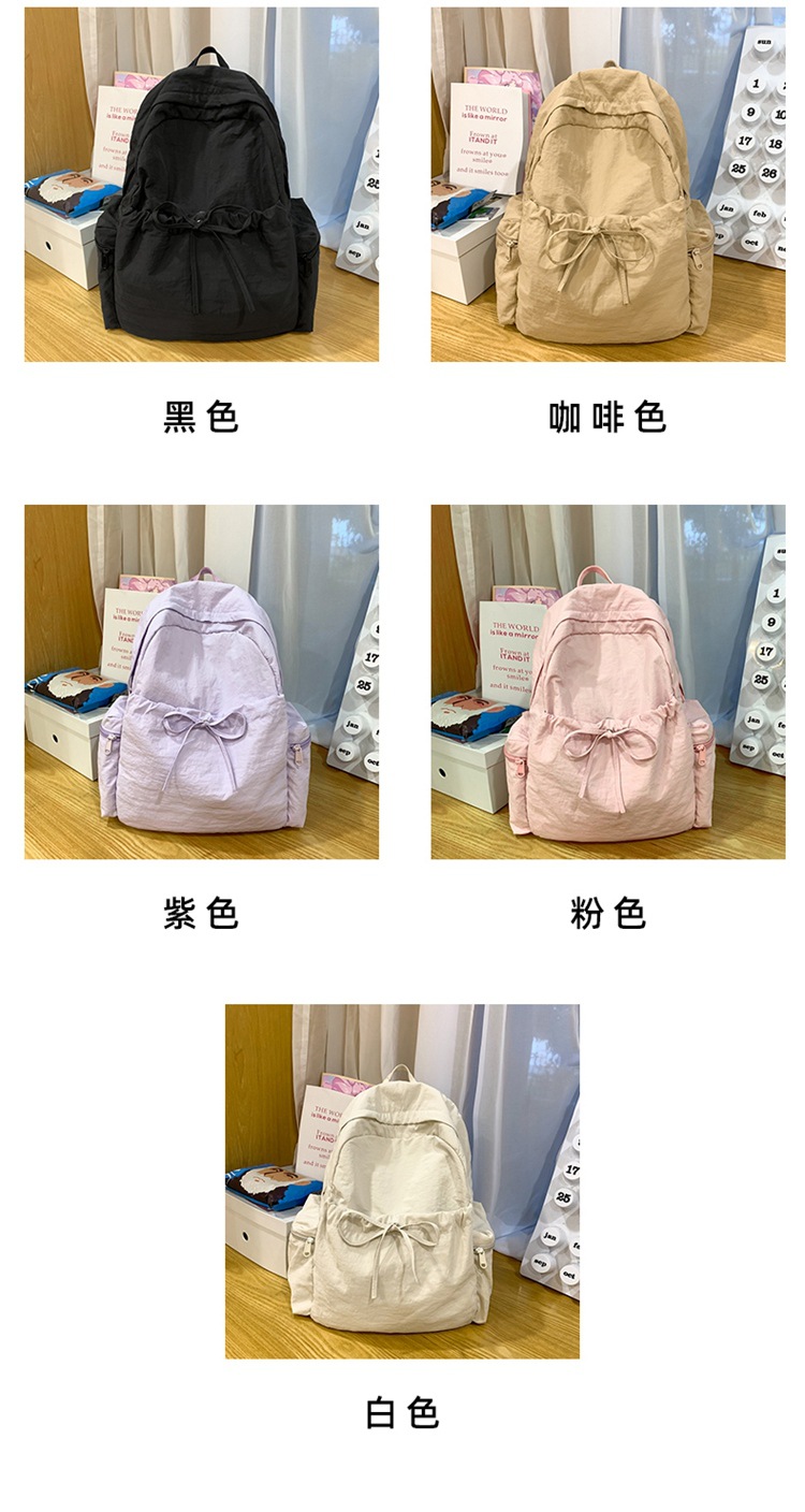 新款时尚轻便简约双肩包女日系文艺学生书包休闲运动旅行纯色背包详情5