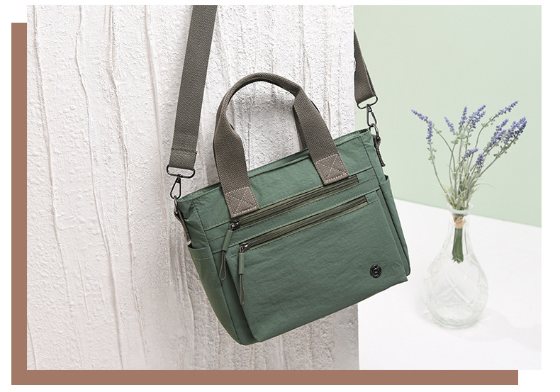 新款韩版单肩包简约潮搭斜挎包轻盈靓丽休闲包都市风尼龙手提女包详情4