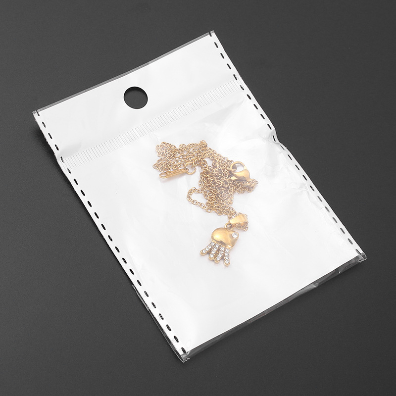 Wholesale of European and American versatile beach and ocean series diamond-encrusted small fish necklaces for women, cross-border light luxury and high-end titanium steel pendants pic 19