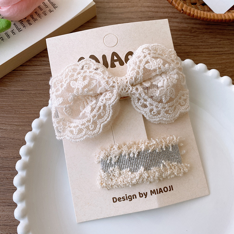 French retro style, off-white fabric, lace, lace, bow, woolen woven, flower fringe, seaside hairpin for women pic 11