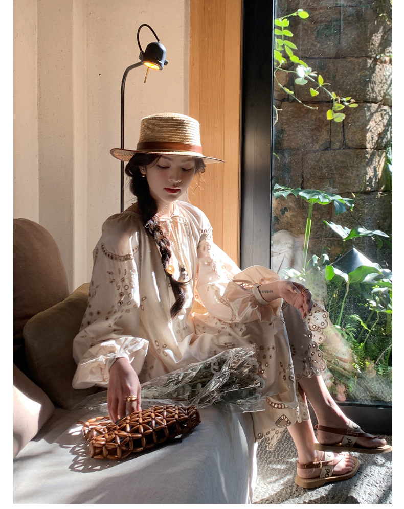 Real photo of a retro, gentle, cut-out embroidered V-neck apricot-colored dress, 2025 new seaside vacation style long-sleeved umbrella dress pic 6