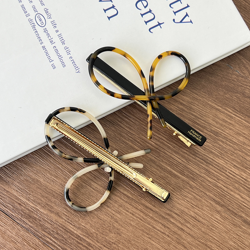 简约ins风交叉蝴蝶结夹子醋酸材质刘海夹高级感侧边碎发一字夹详情4