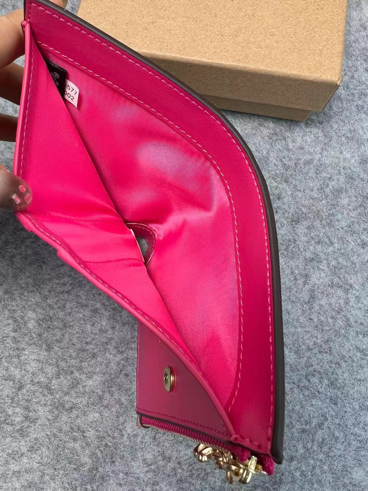 C家两折钱包多卡位PVC印花拉链钱包真皮手拿证件包多款可选详情12