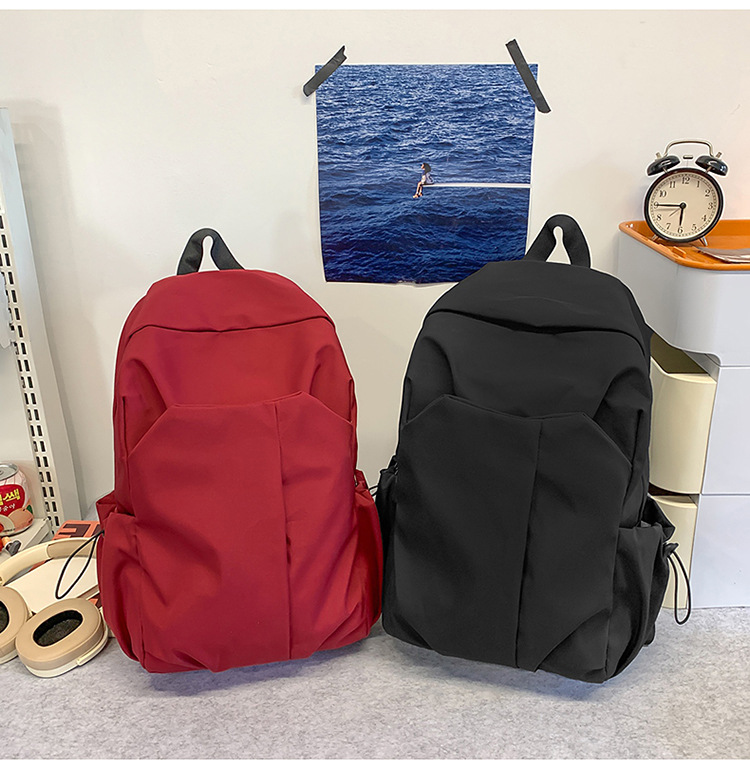 跨境新款休闲双肩包大容量简约潮酷电脑背包男女中大学生纯色书包详情13