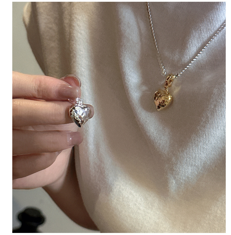 S925 sterling silver Korean version, a niche design sense, heart-shaped pendant with hollow craftsmanship, fashionable and simple basic side pendant pic 14