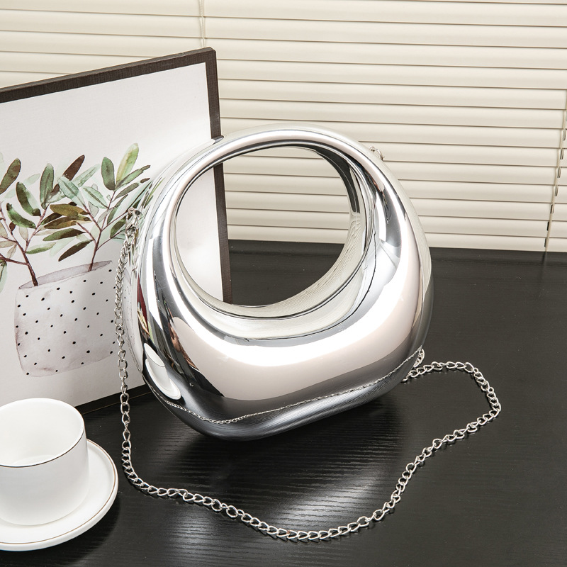 2024春夏欧美爆款跨境弯月包金银晚宴包手提包化妆亚克力包详情4