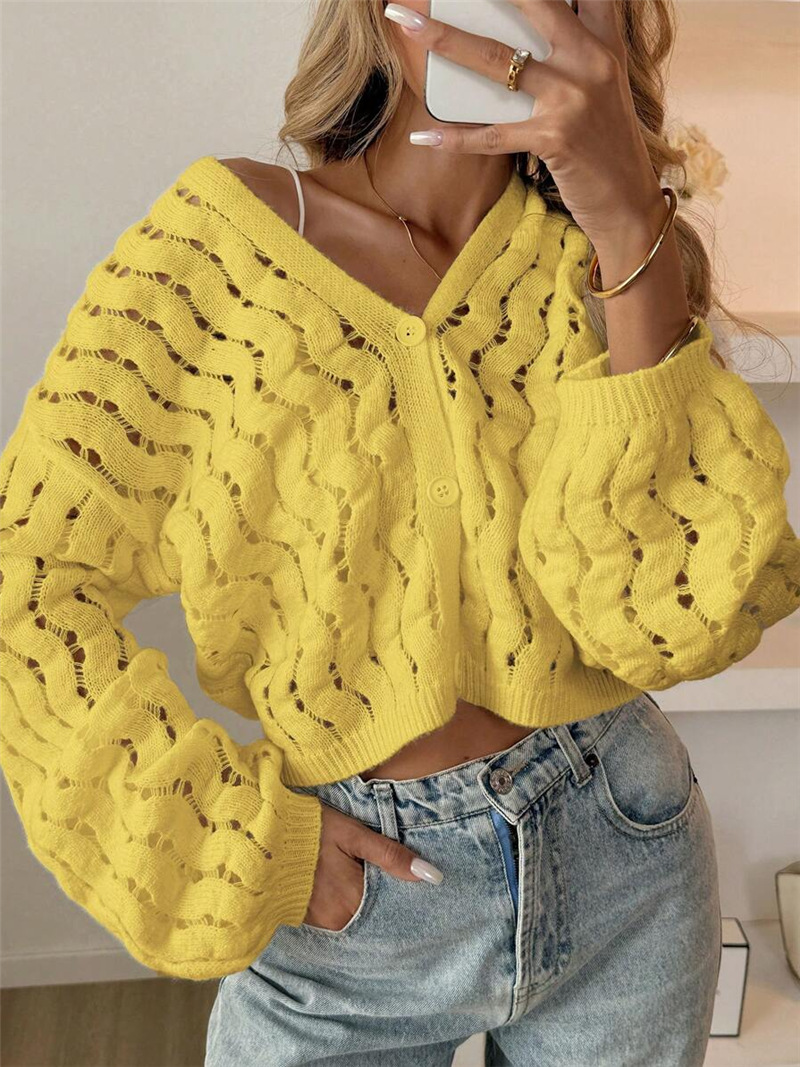 This cross-border Amazon knitted coat from Europe and America is a casual, hollowed-out button solid-color long-sleeved sweater with a strong sense of design pic 11