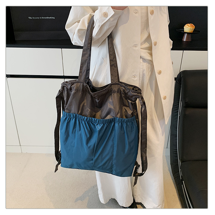 新款单肩包托特双肩折叠包手提简约通勤大容量时尚便携详情45