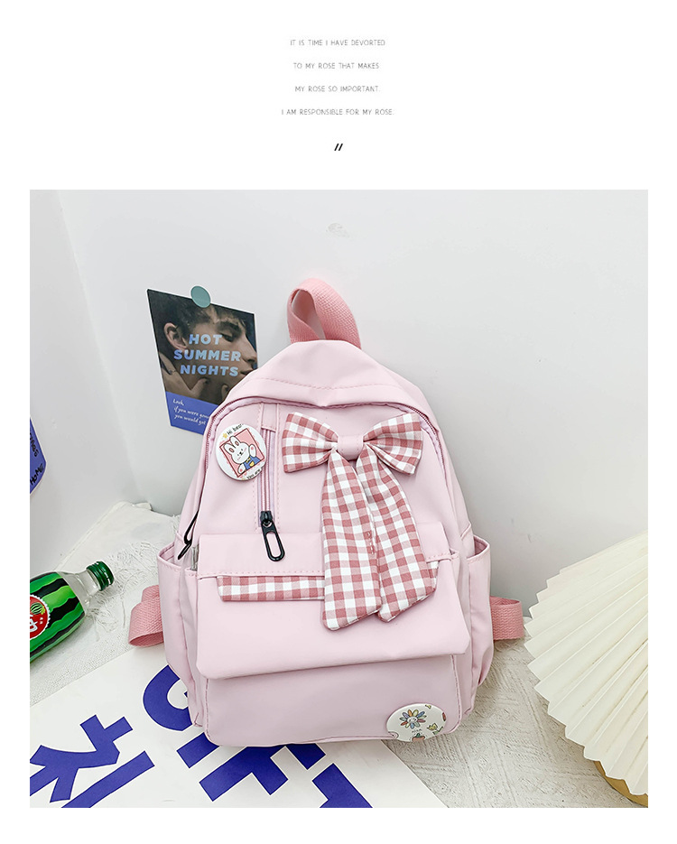 蝴蝶结书包女小学生大容量三到六年级初中轻便减负可爱简约双肩包详情16