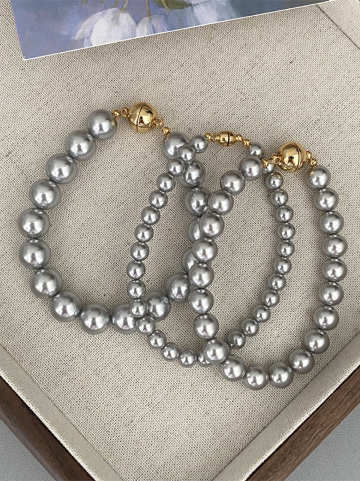 This is a trendy accessory for women, featuring a strong Australian white round magnetic pearl bracelet. It exudes a light luxury, niche and high-end vibe pic 7