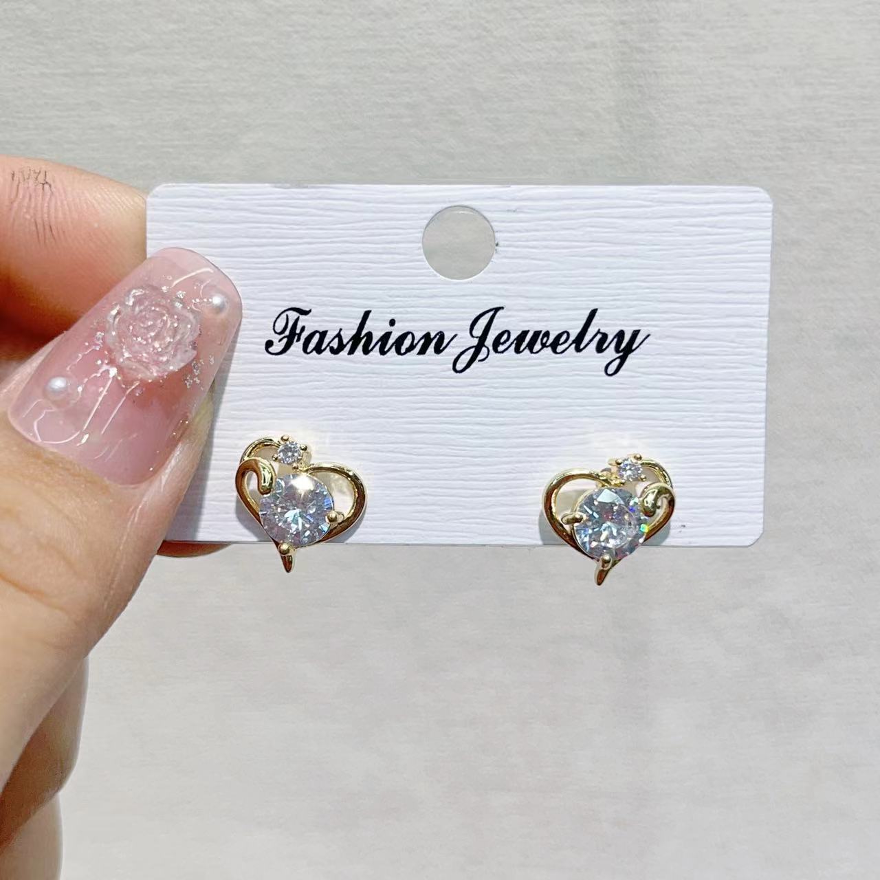 High-end stud earrings, a niche design for women, heart-shaped butterfly copper plated with real gold zircon, a light luxury and versatile style pic 6