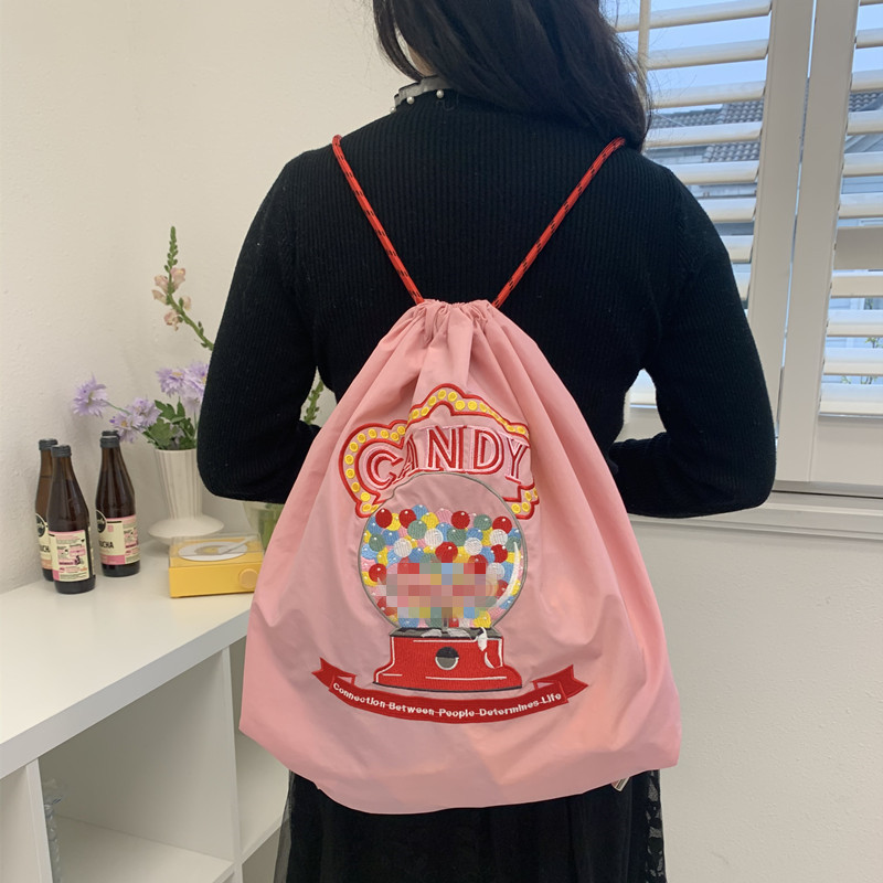 Estilo japonés moda mochila linda dibujos animados eco-friendly extractor cordón bordado de gran capacidad casual bolsa de estudiante tendencia de la calle pic 9
