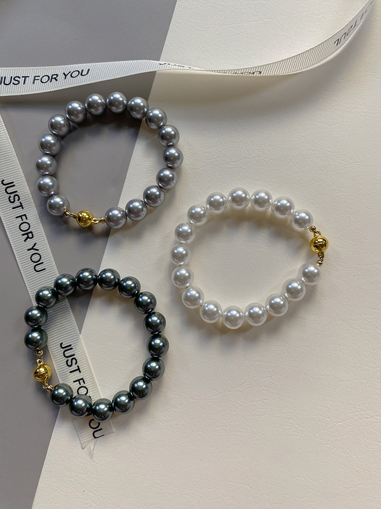 This is a trendy accessory for women, featuring a strong Australian white round magnetic pearl bracelet. It exudes a light luxury, niche and high-end vibe pic 16