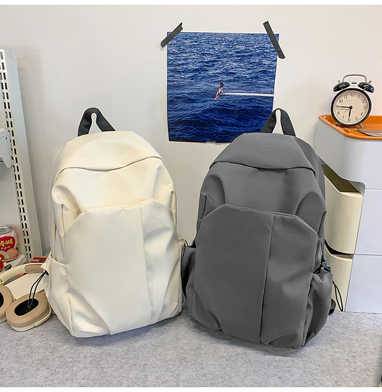 跨境新款休闲双肩包大容量简约潮酷电脑背包男女中大学生纯色书包详情12